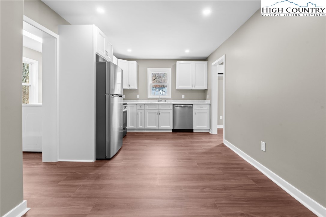 2015 Highway 194 Boone, NC 28607 - Photo 6 of 40 a kitchen with stainless steel appliances granite countertop a refrigerator and a stove top oven