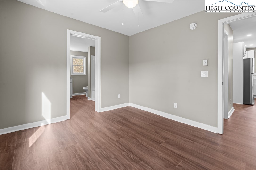 2015 Highway 194 Boone, NC 28607 - Photo 10 of 40 wooden floor in an empty room with a window