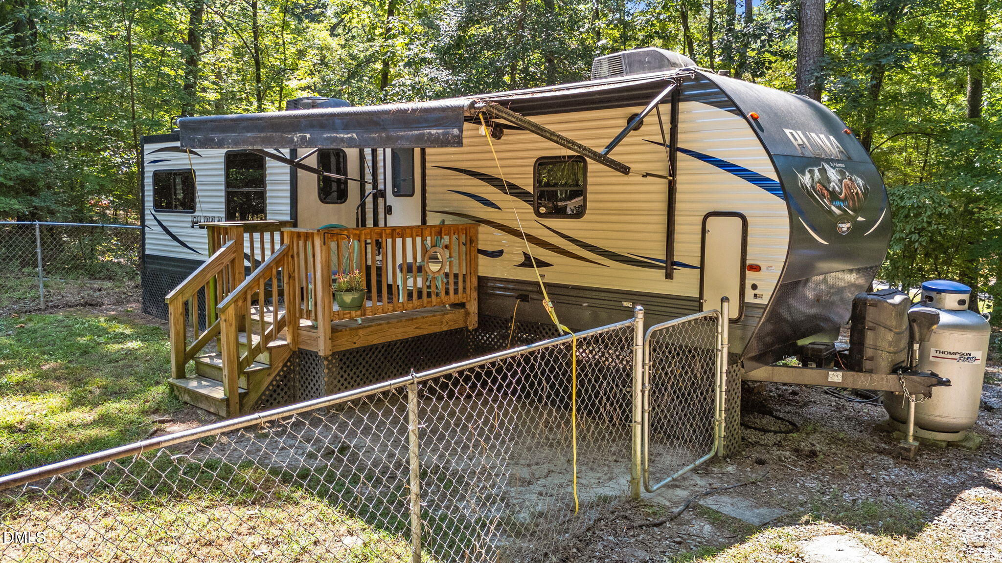 108 Poteau Drive Spring Hope, NC 27882 - Photo 17 of 28 a view of a house with wooden fence