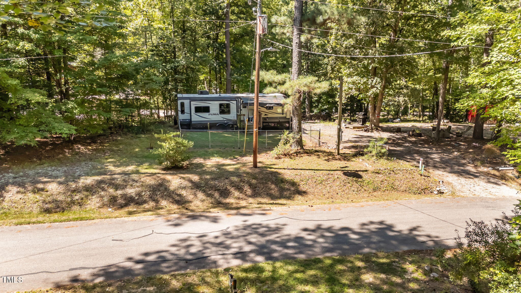 108 Poteau Drive Spring Hope, NC 27882 - Photo 22 of 28 a view of a street with a tree