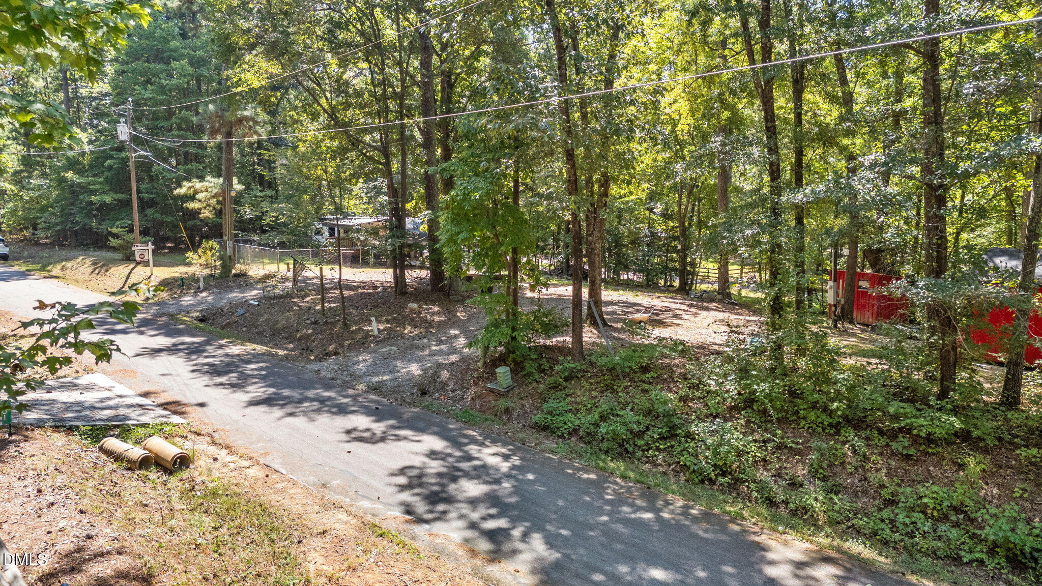 108 Poteau Drive Spring Hope, NC 27882 - Photo 24 of 28 a view of outdoor space with deck and tree