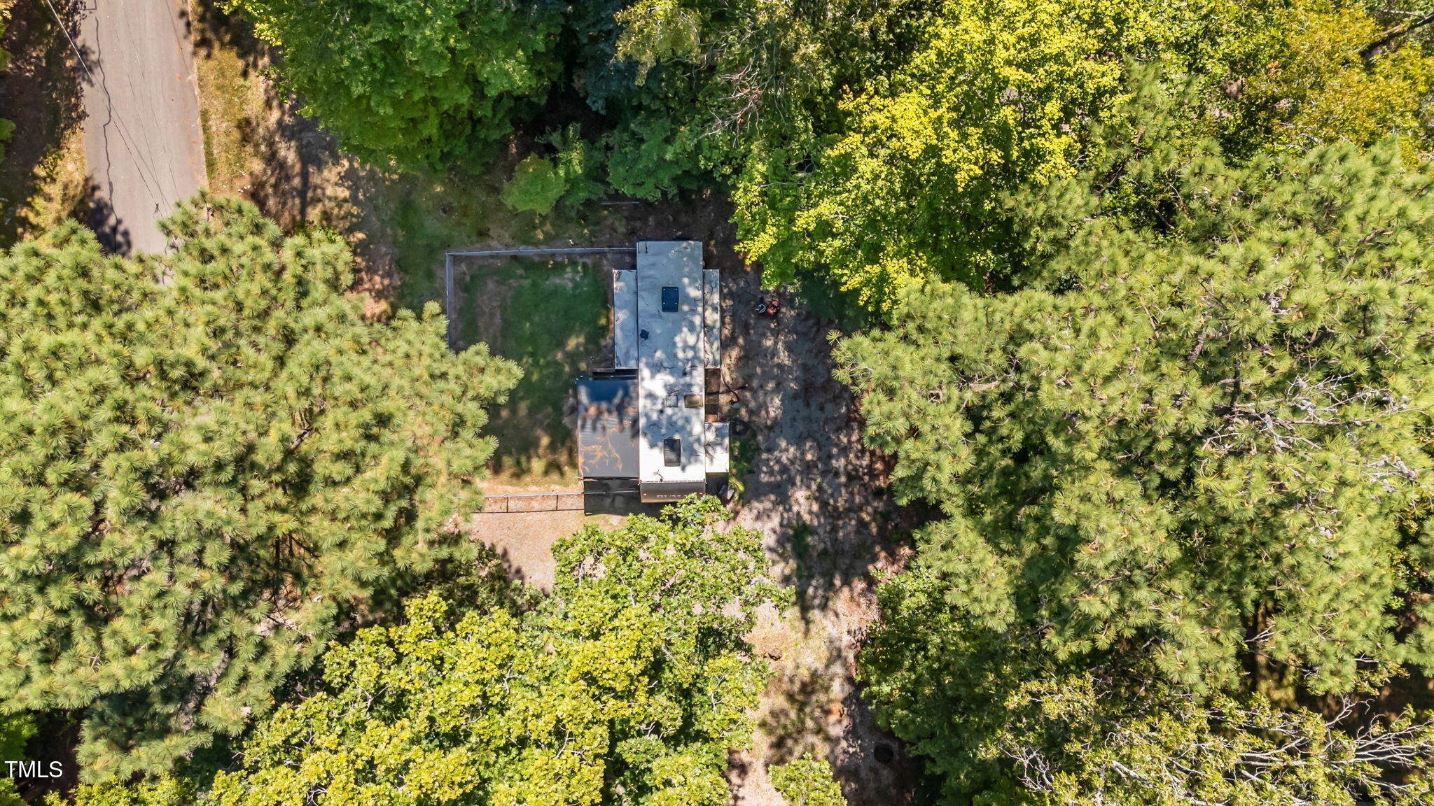108 Poteau Drive Spring Hope, NC 27882 - Photo 25 of 28 a view of a yard with plants