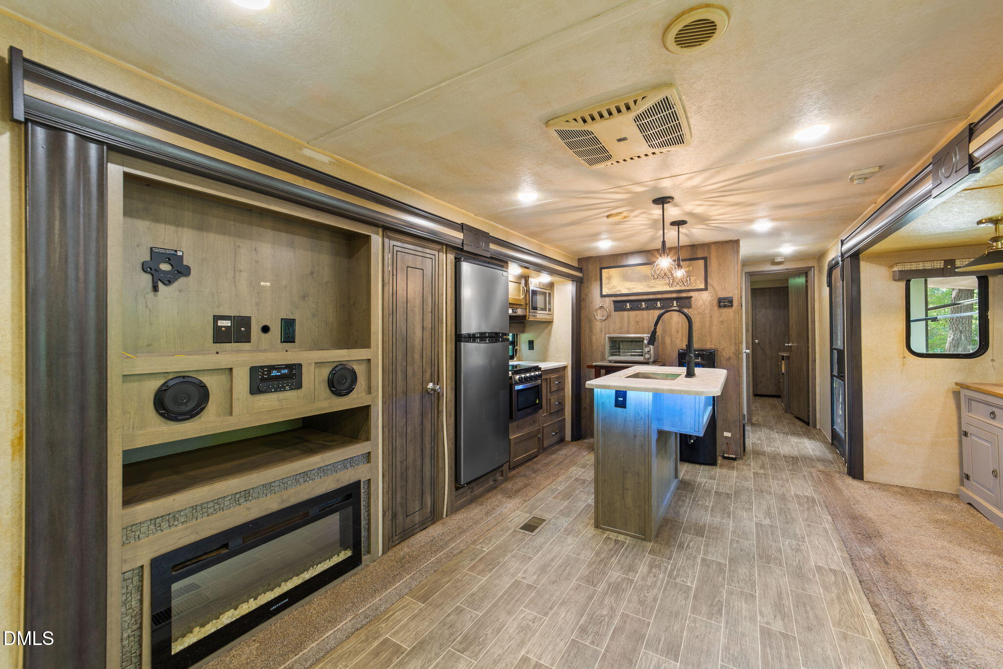 108 Poteau Drive Spring Hope, NC 27882 - Photo 8 of 28 a kitchen with refrigerator and window