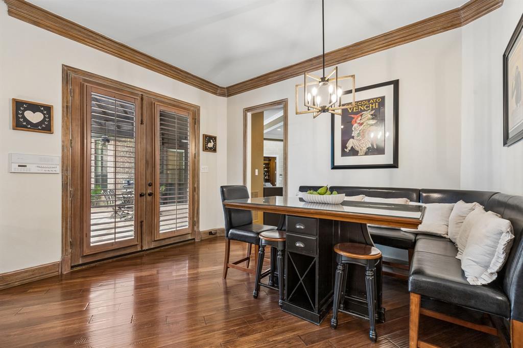 310 Deer Path Fairview, TX 75069 - Photo 14 of 40 a view of a dining room with furniture window and wooden floor