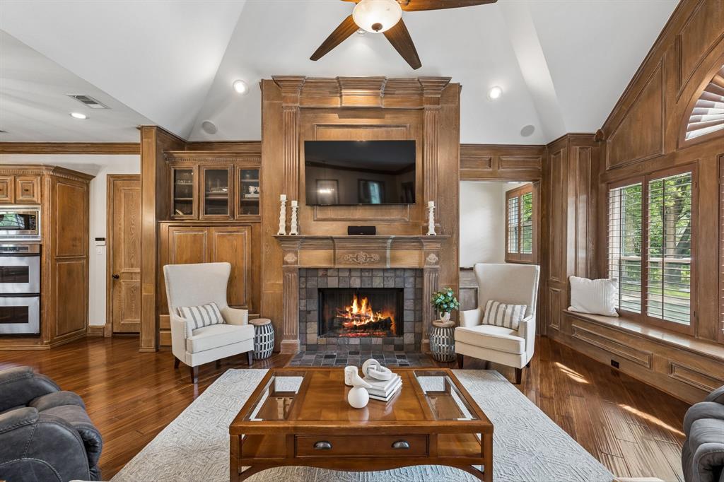 310 Deer Path Fairview, TX 75069 - Photo 16 of 40 Elevated architectural design with soaring ceilings, gorgeous hardwood floors, detailed moldings, solid core doors, plantation shutters, and quality craftsmanship throughout.