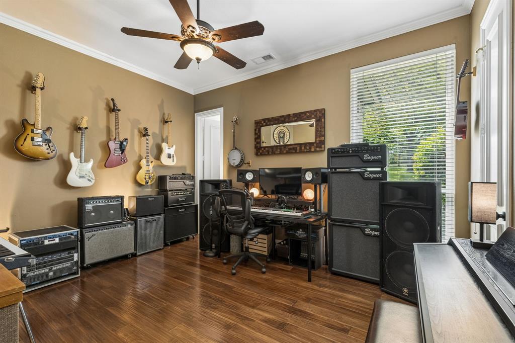 310 Deer Path Fairview, TX 75069 - Photo 26 of 40 a view of a workspace with furniture and a window