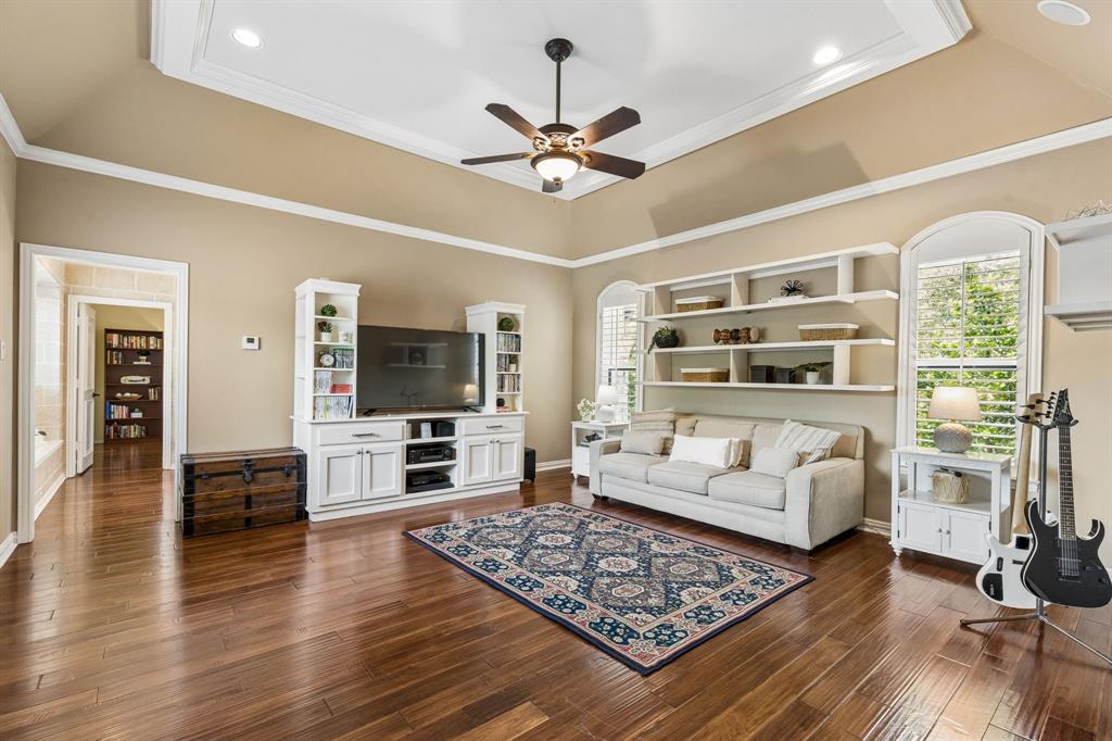 310 Deer Path Fairview, TX 75069 - Photo 39 of 40 a living room with furniture and a flat screen tv