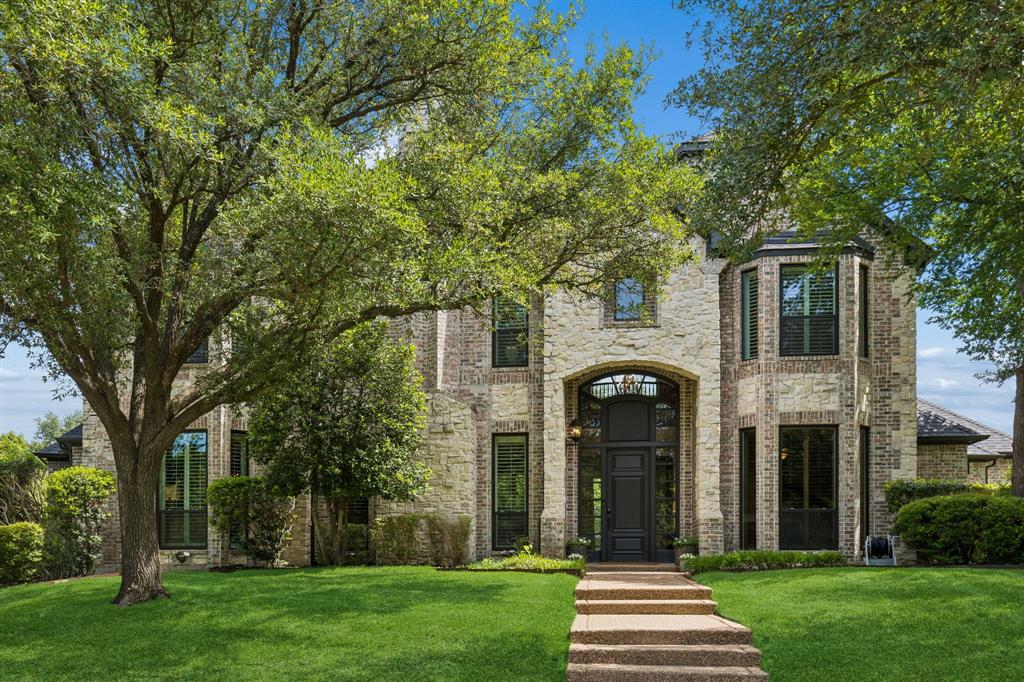 310 Deer Path Fairview, TX 75069 - Photo 38 of 40 a front view of a house with garden