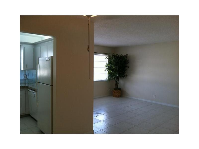 2131 Northeast 41st Street, Unit 108 Lighthouse Point, FL 33064 - Photo 6 of 8 Exterior Front