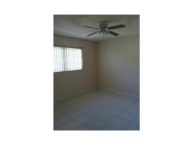 2131 Northeast 41st Street, Unit 108 Lighthouse Point, FL 33064 - Photo 7 of 8 Exterior Front