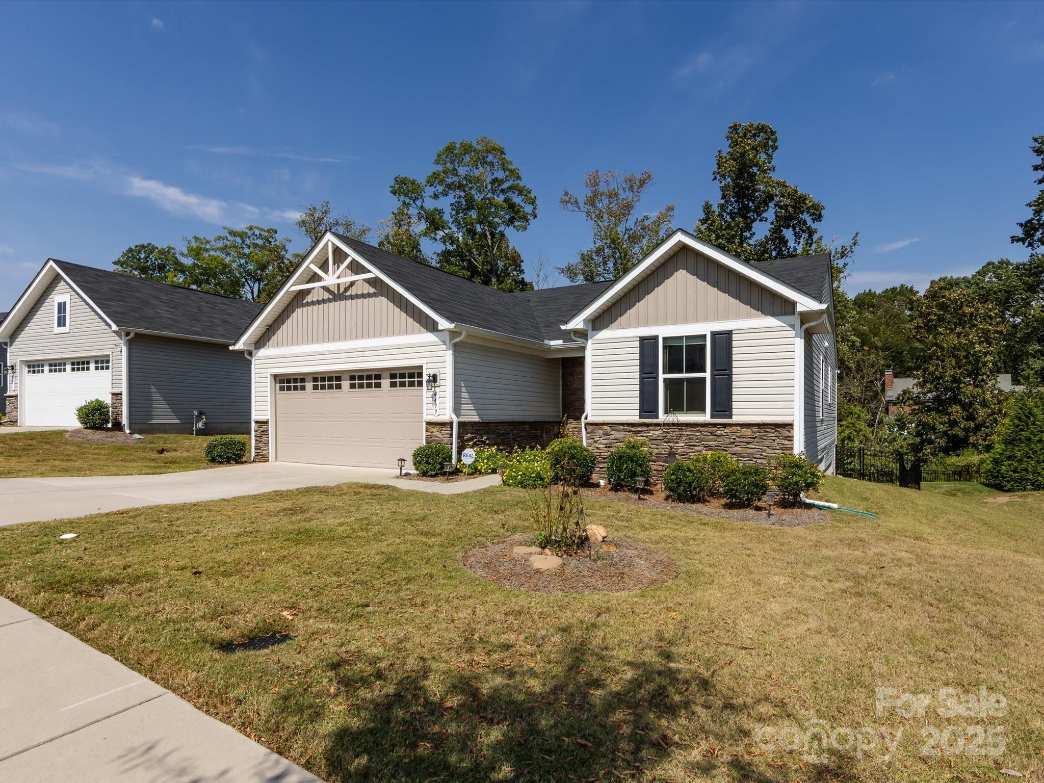 4499 Hunton Dale Road Northwest Concord, NC 28027 - Photo 2 of 43 a front view of a house with a yard