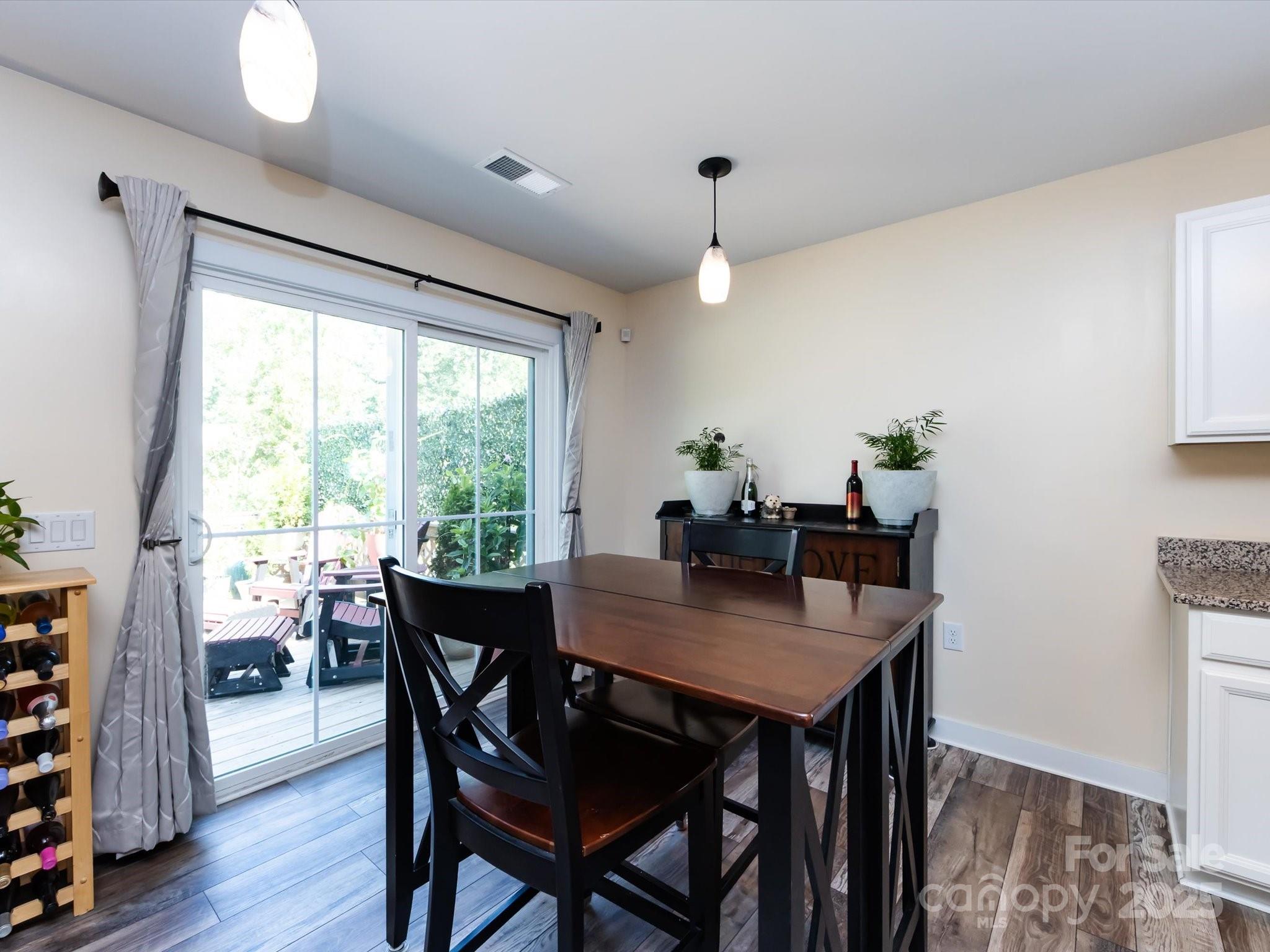4499 Hunton Dale Road Northwest Concord, NC 28027 - Photo 24 of 43 a view of a dining room with furniture window and outside view