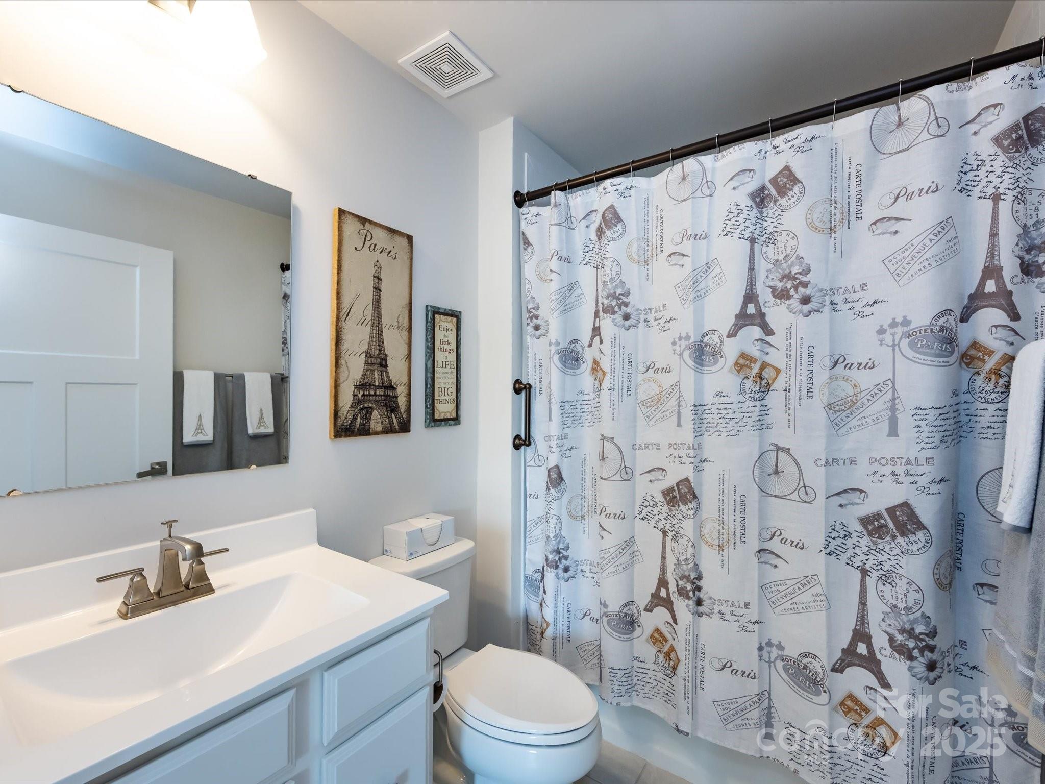 4499 Hunton Dale Road Northwest Concord, NC 28027 - Photo 34 of 43 a bathroom with a sink and a mirror