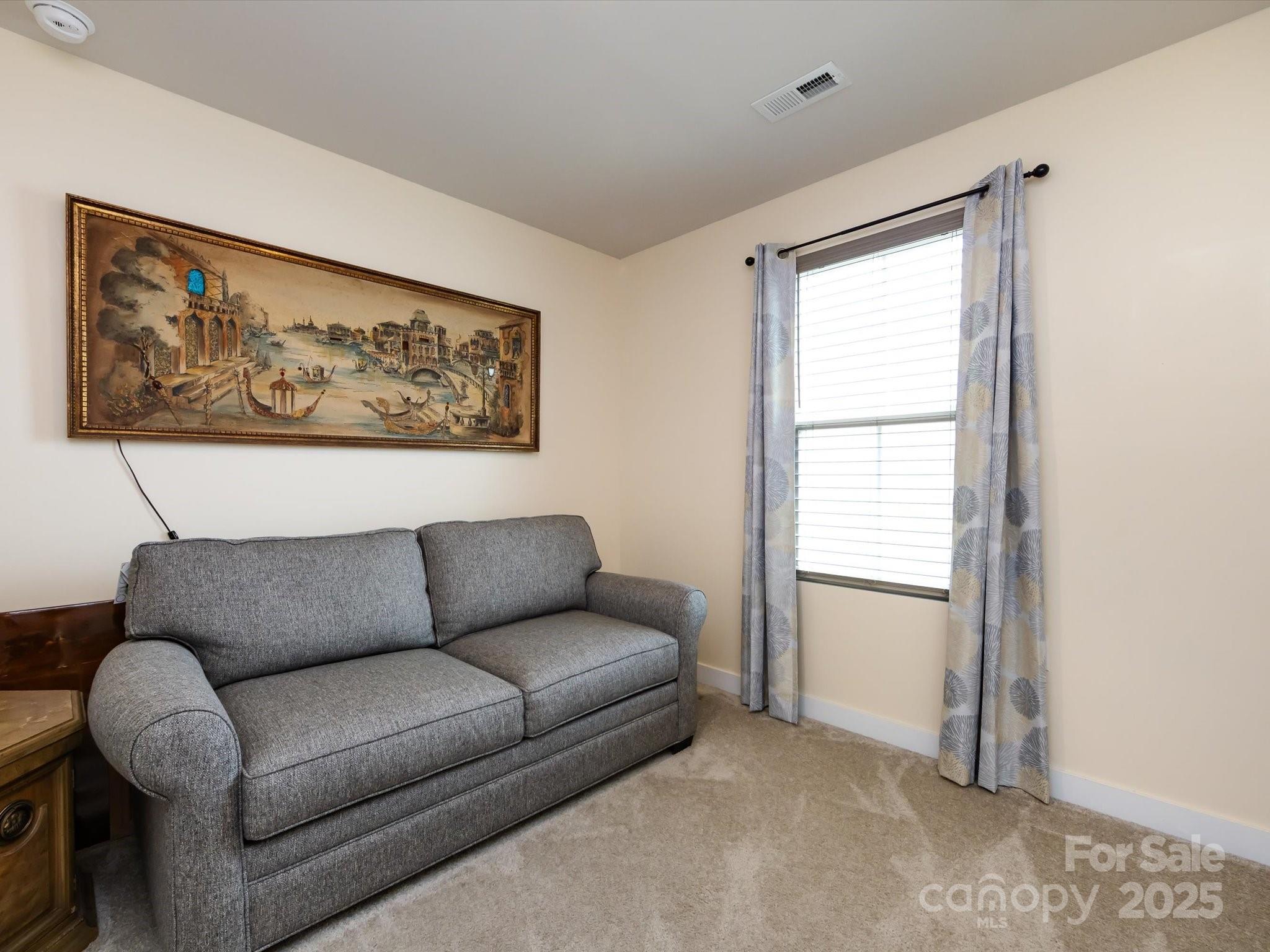 4499 Hunton Dale Road Northwest Concord, NC 28027 - Photo 36 of 43 a living room with furniture and a window