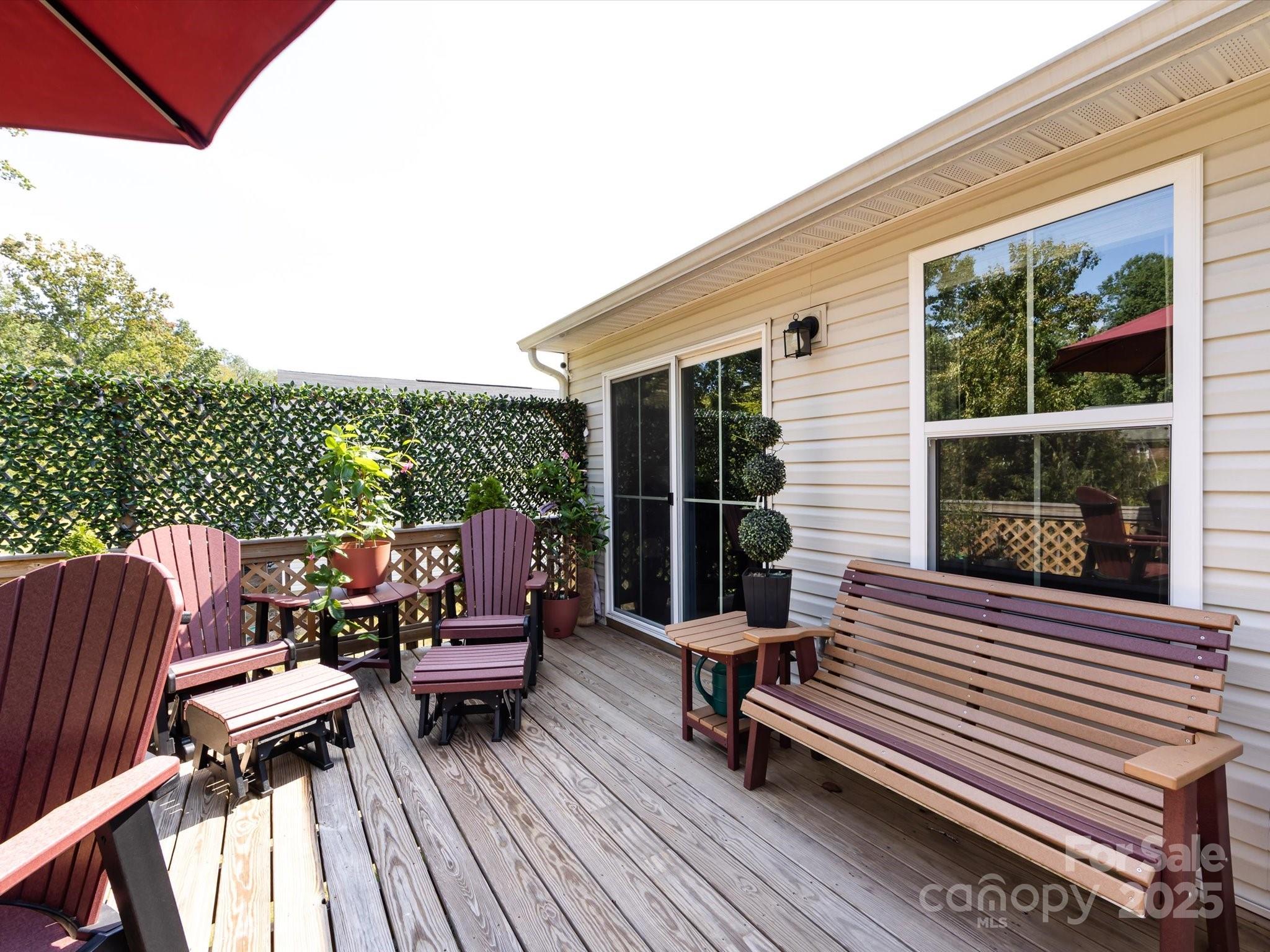 4499 Hunton Dale Road Northwest Concord, NC 28027 - Photo 42 of 43 a view of a patio with a table and chairs