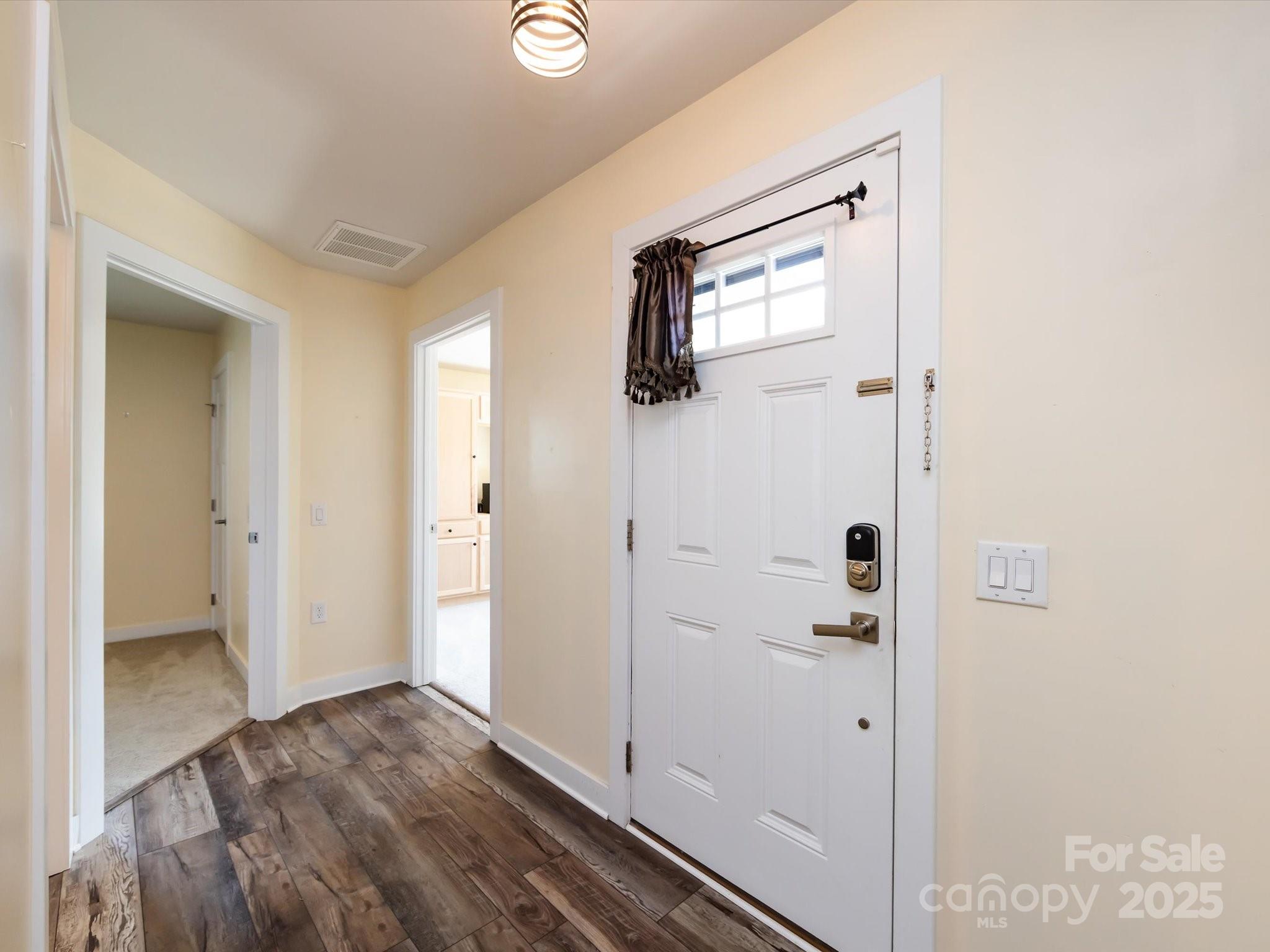 4499 Hunton Dale Road Northwest Concord, NC 28027 - Photo 6 of 43 a view of a bathroom from a hallway