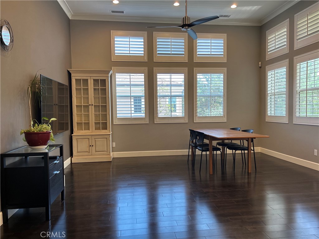 134 Rodeo Irvine, CA 92602 - Photo 3 of 23 a view of a dining room with furniture window and wooden floor
