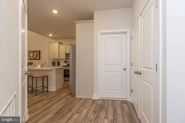 a view of kitchen with wooden floor