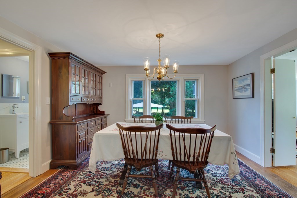 10 Clearwater Road Winchester, MA 01890 - Photo 9 of 39 a view of a dining room with furniture wooden floor and chandelier