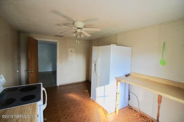 5905 Ricker Road Jacksonville, FL 32244 - Photo 11 of 24 a view of a storage & utility room with a sink