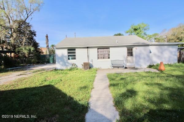 5905 Ricker Road Jacksonville, FL 32244 - Photo 20 of 24 a front view of a house with garden