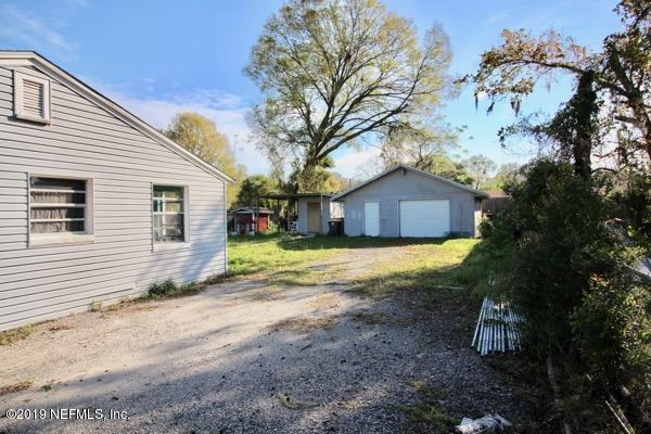 5905 Ricker Road Jacksonville, FL 32244 - Photo 23 of 24 a house view with a backyard space