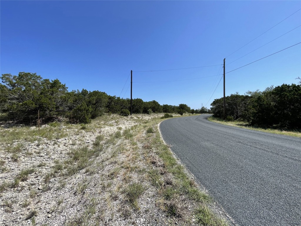 Tbd Anderson Trail Leander, TX 78641 - Photo 2 of 18 a view of a road with a yard