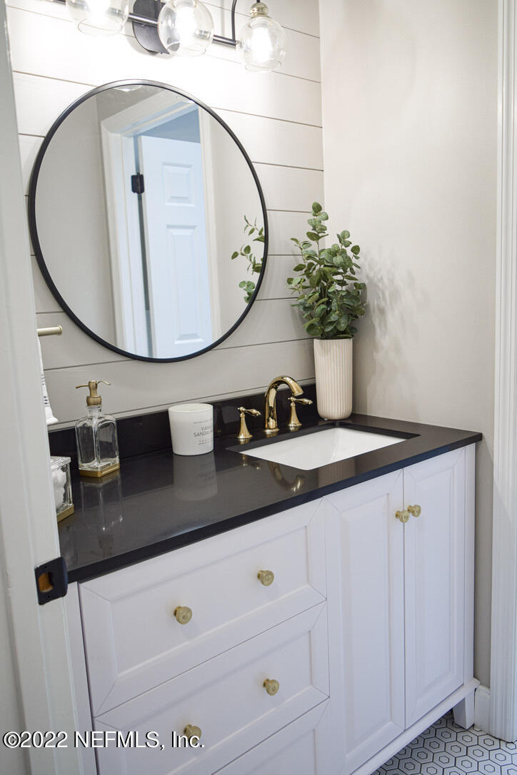 54608 Armstrong Road Callahan, FL 32011 - Photo 21 of 22 a sink with a mirror