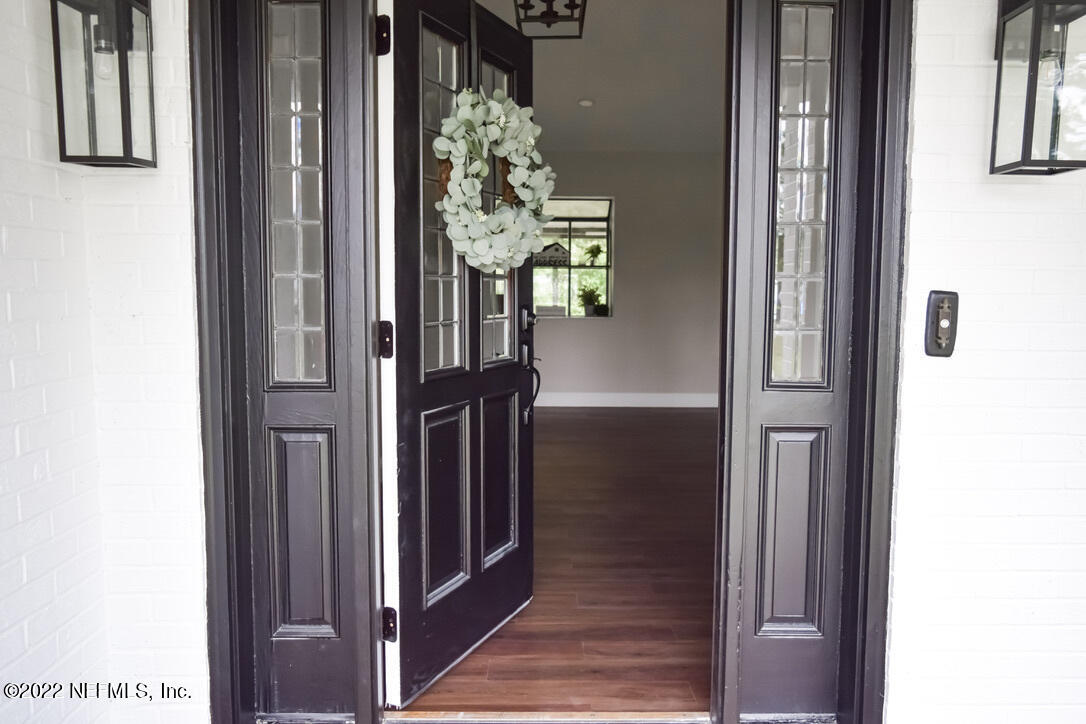 54608 Armstrong Road Callahan, FL 32011 - Photo 4 of 22 a view of a hallway with a elevator