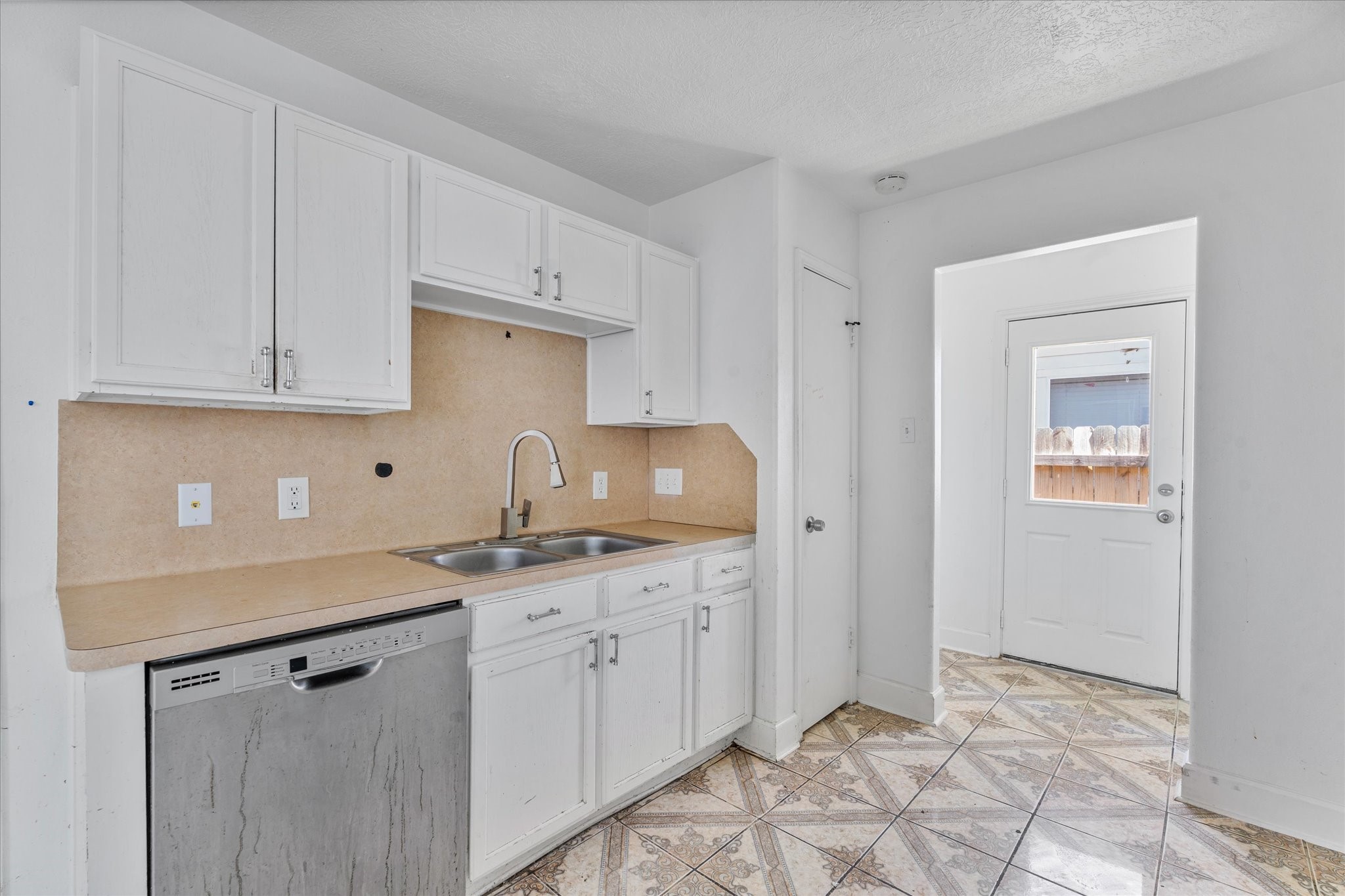1410 Hade Falls Lane Houston, TX 77073 - Photo 15 of 25 a kitchen with stainless steel appliances granite countertop a sink and cabinets