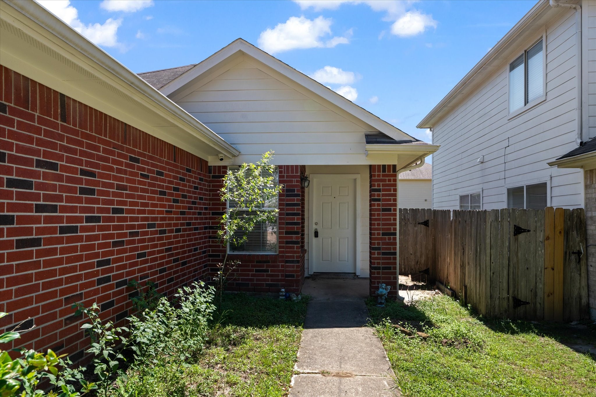 1410 Hade Falls Lane Houston, TX 77073 - Photo 2 of 25 a front view of a house with a yard