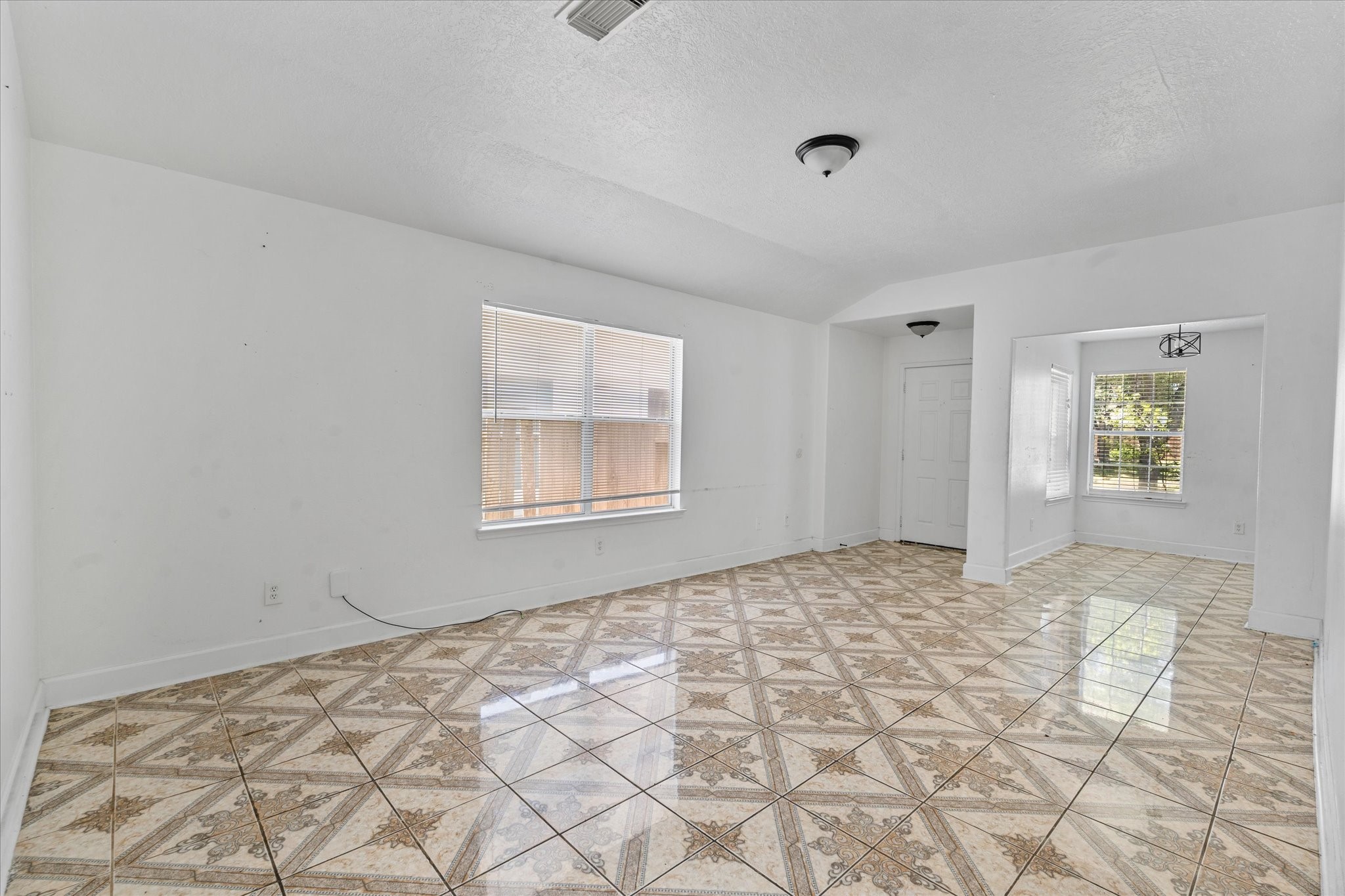 1410 Hade Falls Lane Houston, TX 77073 - Photo 6 of 25 a bedroom with a bed and a window