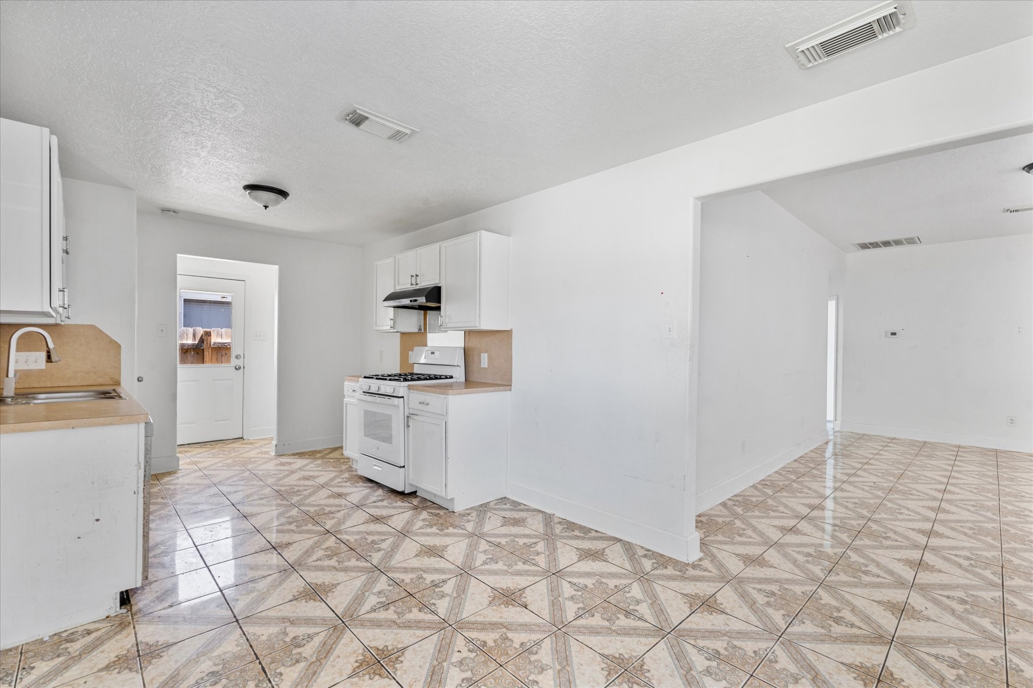 1410 Hade Falls Lane Houston, TX 77073 - Photo 10 of 25 a room with a dresser and white cabinets