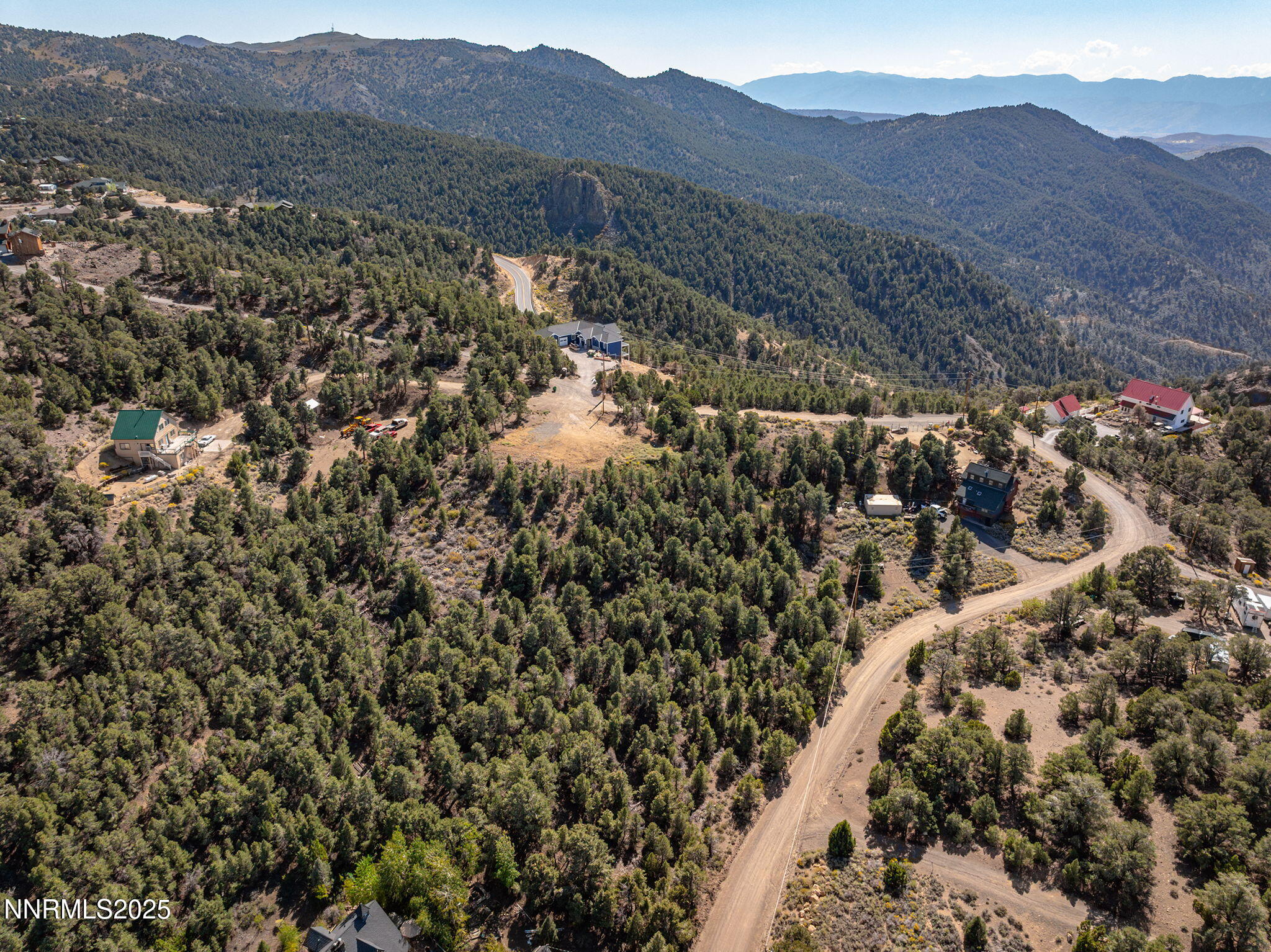 21281 Highland Road Reno, NV 89521 - Photo 14 of 20 a view of a house with a mountain