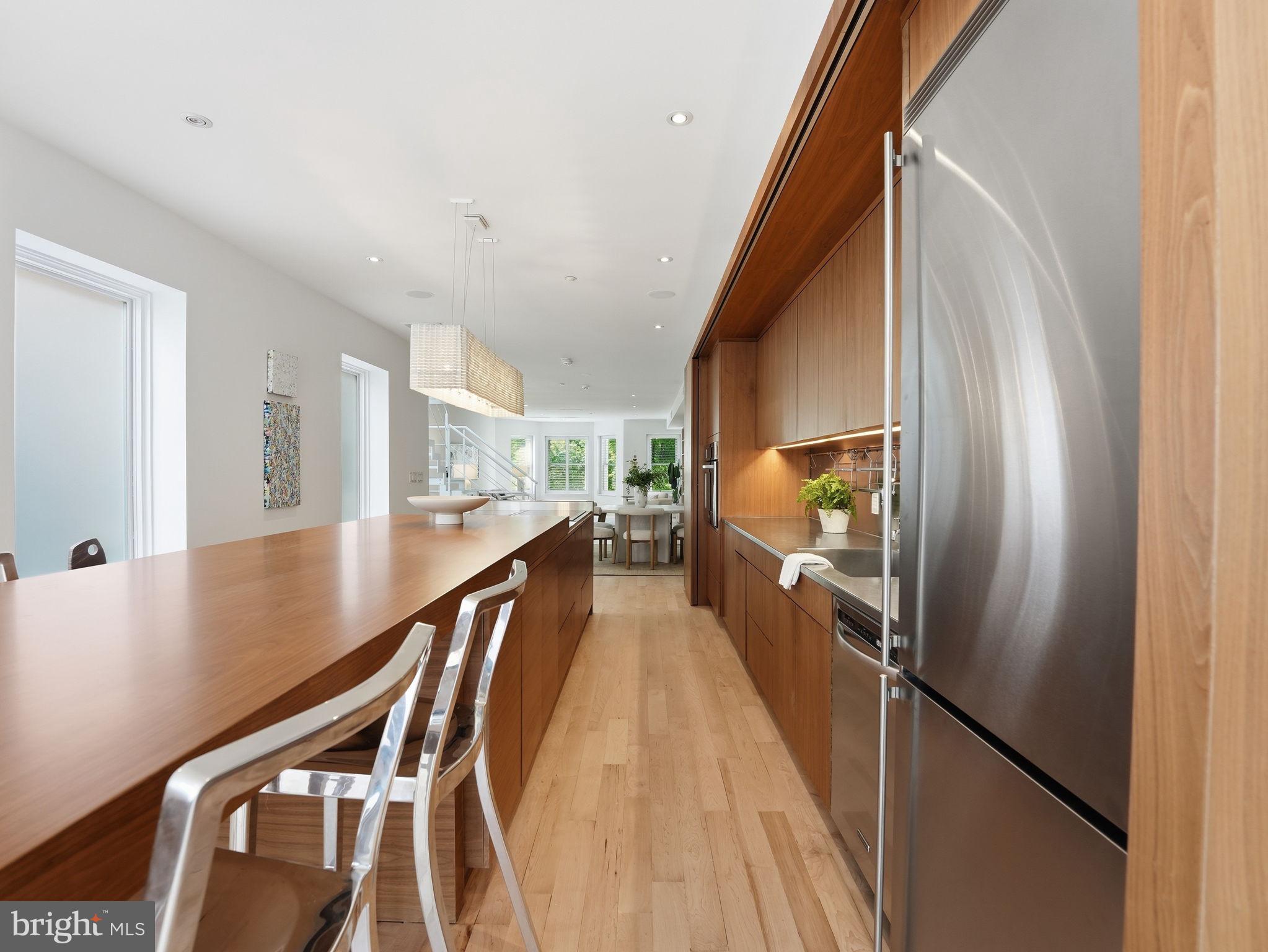 1845 Calvert Street Northwest Washington, DC 20009 - Photo 16 of 48 a view of a kitchen with furniture and stairs