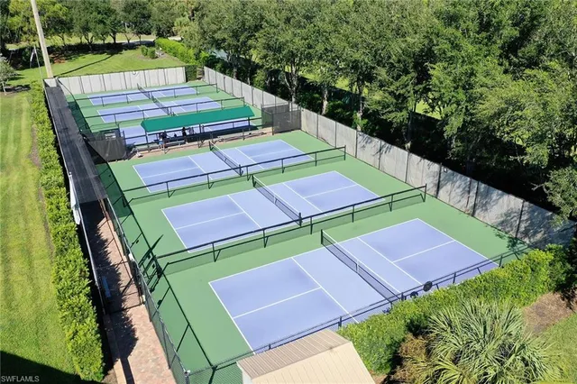 an aerial view of an chairs and table in the terrace