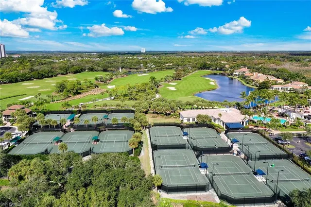 an aerial view of a residential houses with outdoor space