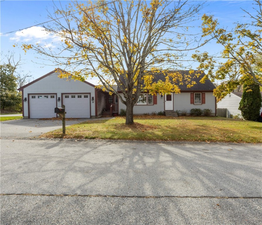 Classic Cape Cod Home with Attached Mudroom and 3 Car Garage