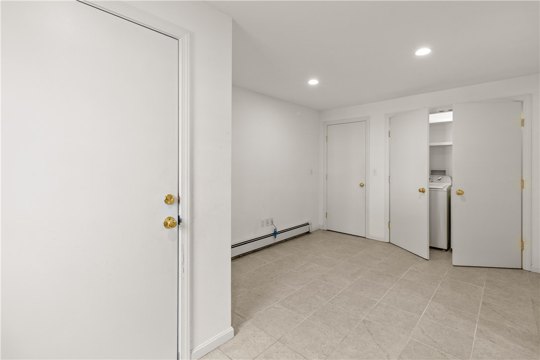 12 Beth Road Tiverton, RI 02878 - Photo 8 of 42 Spacious Heated Mud Room with Laundry & Storage
