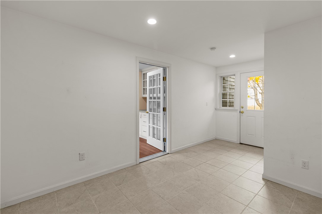 12 Beth Road Tiverton, RI 02878 - Photo 9 of 42 Spacious Heated Mud Room - Flexible Bonus Space