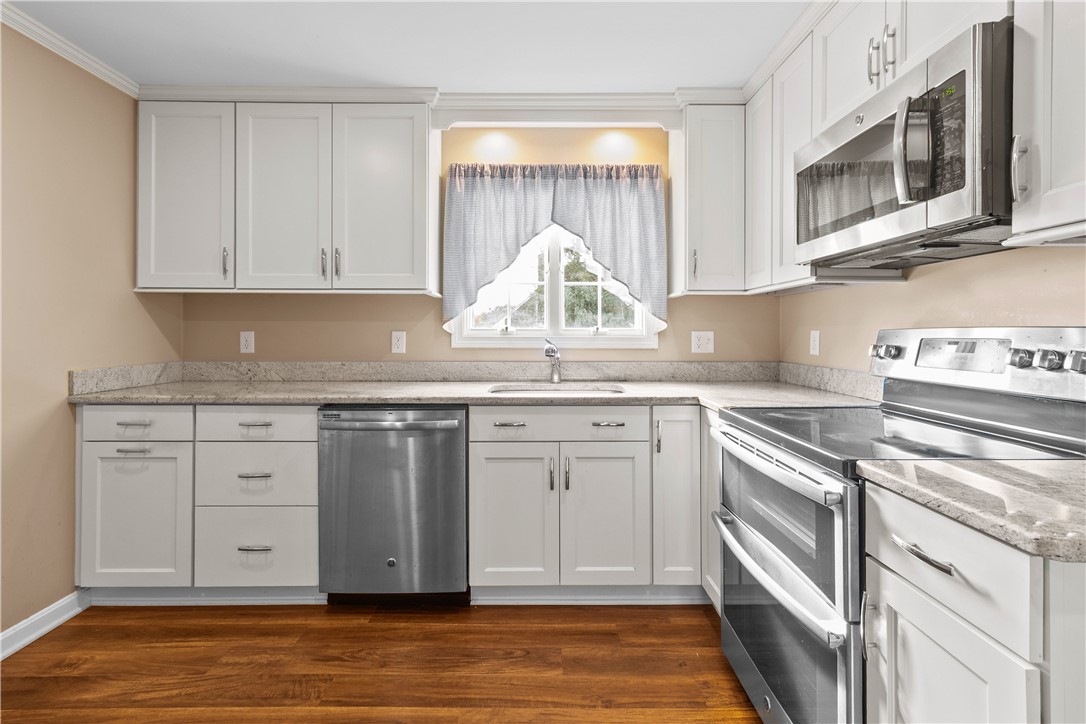12 Beth Road Tiverton, RI 02878 - Photo 10 of 42 Tastefully Renovated Kitchen with Granite and Stainless Appliances