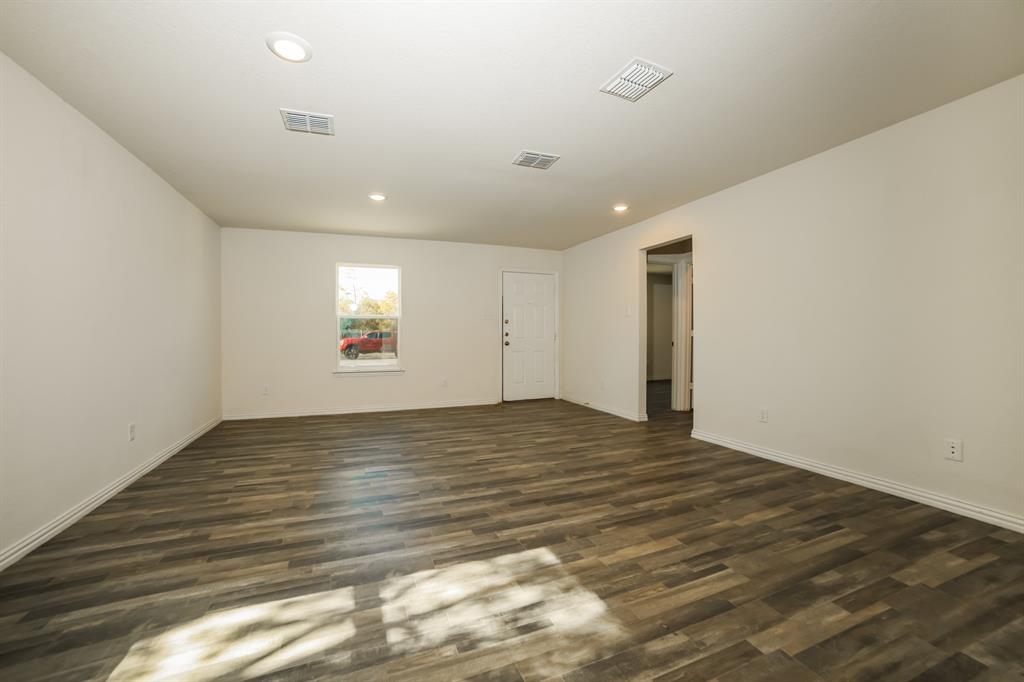 903 Olive Street Waco, TX 76704 - Photo 4 of 21 a view of an empty room and window