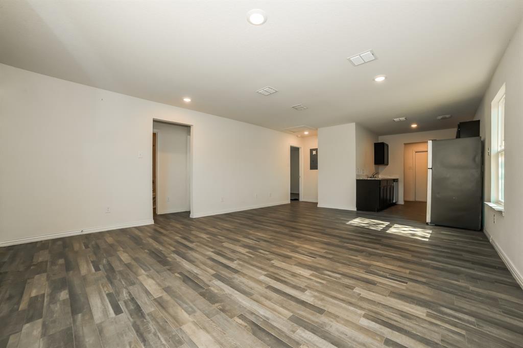 903 Olive Street Waco, TX 76704 - Photo 5 of 21 a view of an empty room with a window