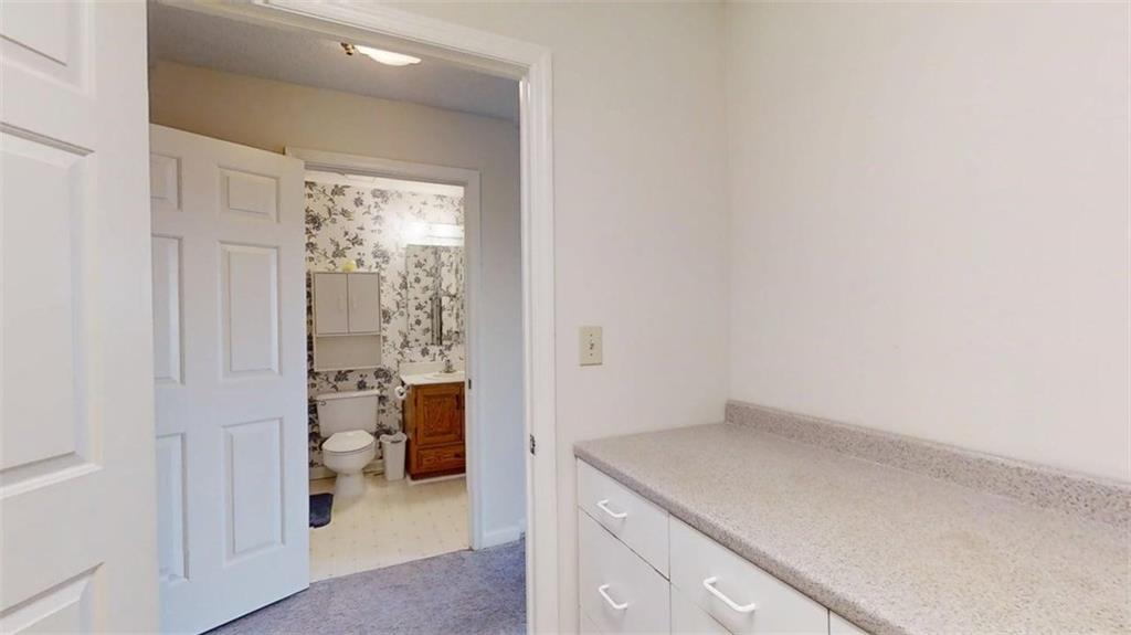 300 Johnson Ferry Road, Unit A1013 Atlanta, GA 30328 - Photo 11 of 18 a view of bathroom and utility room