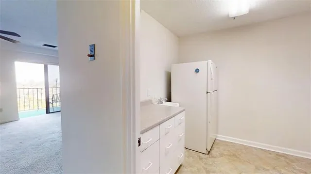a bathroom with a sink and shower