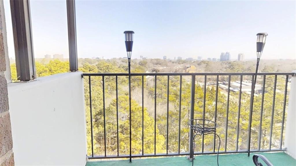 300 Johnson Ferry Road, Unit A1013 Atlanta, GA 30328 - Photo 3 of 18 a view of a city from a balcony
