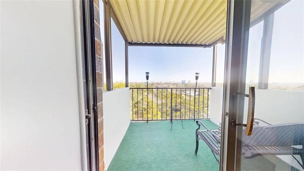 300 Johnson Ferry Road, Unit A1013 Atlanta, GA 30328 - Photo 10 of 18 a view of a balcony and yard