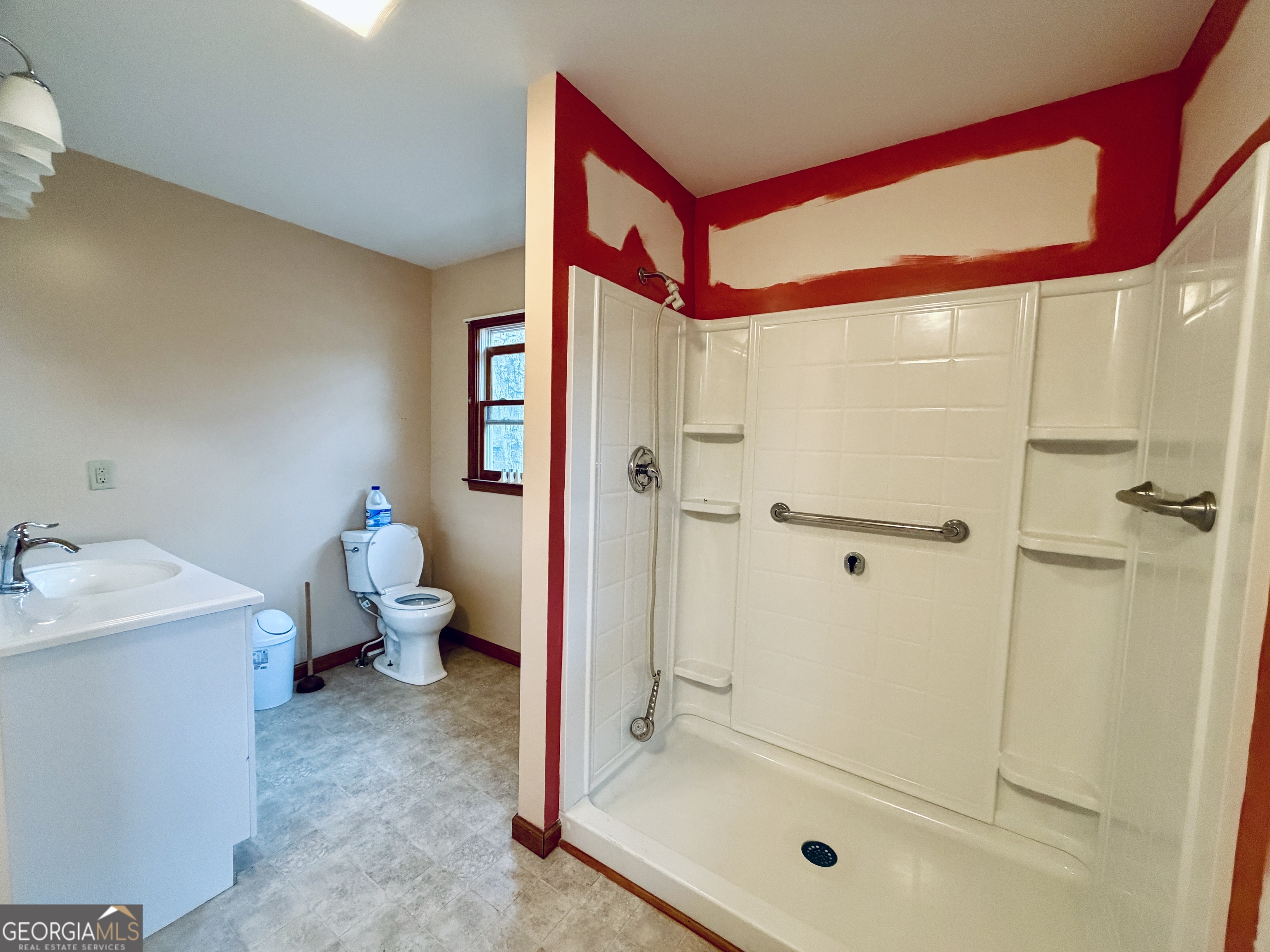 43 Sycamore Drive Toccoa, GA 30577 - Photo 16 of 22 a bathroom with a bathtub and a shower