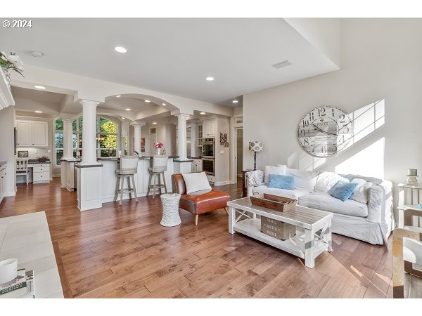 264 Southeast 41st Court Gresham, OR 97080 - Photo 15 of 37 a living room with furniture and wooden floor