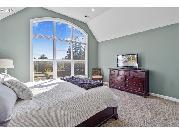 264 Southeast 41st Court Gresham, OR 97080 - Photo 23 of 37 a bedroom with a bed and a window